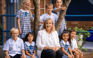 Galilee Bondi Principal Helen Paton celebrating 2025 NAPLAN results with students